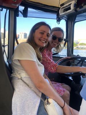 Dr Iona Ashworth and Dr Lauren Stott taking the wheel of a famous Boston Duck Boat while presenting their research at the International Workshop on CLL (iwCLL)