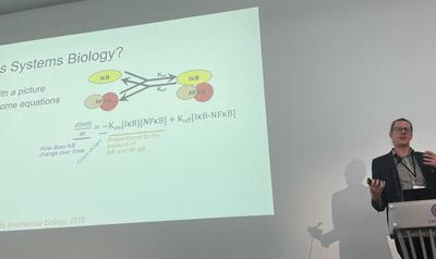 Simon educating the audience on the power of Systems Biology